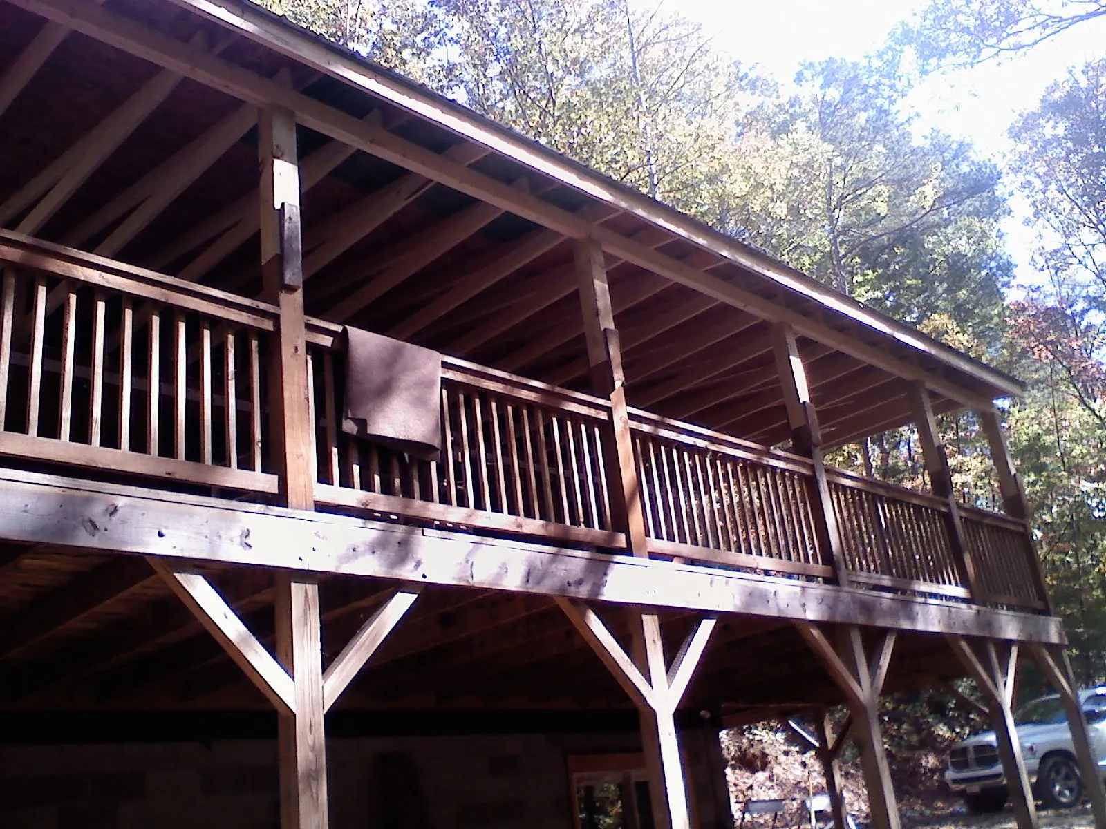 Timber framing under a new elevated porch and deck — Roof Leak Repair in Cypress by Roofing Brothers